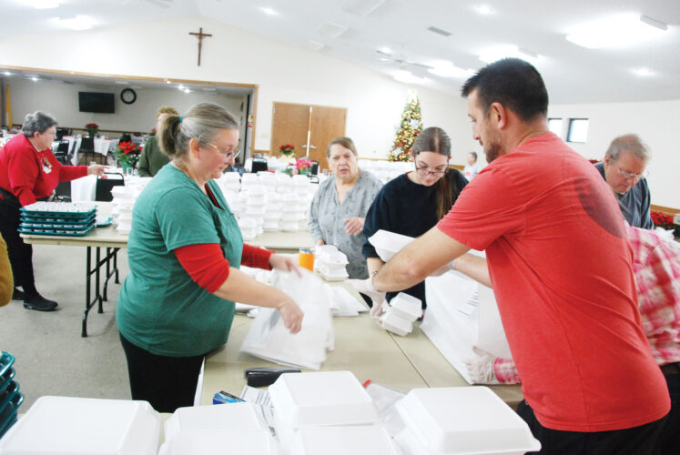 Volunteers in Marietta preparing for Christmas Day feast